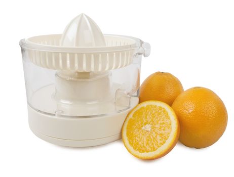 Juice squeezer with few oranges isolated on white background