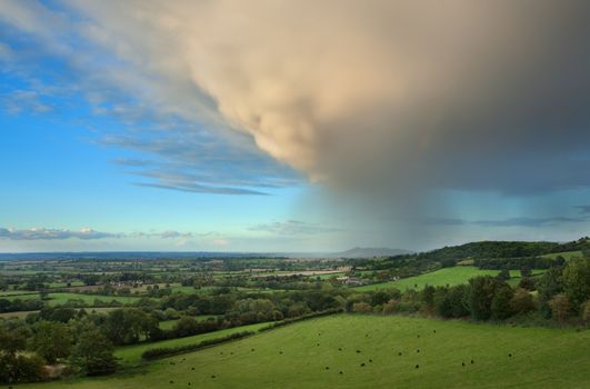 Rain clouds over rural Gloucestershire near Chipping Campden, England.