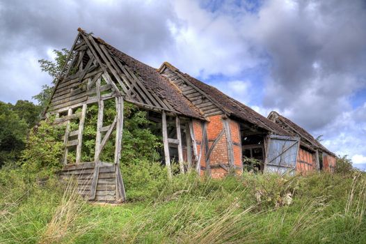 Overgrown old barn, Warwickshire, England.
