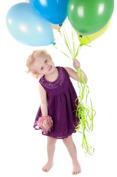 Shot little cute girl in dress with air balloonsisolated on white