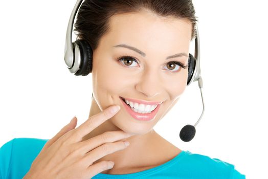 Beautiful young call-center assistant smiling , isolated