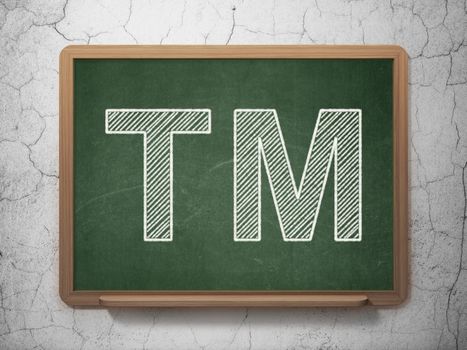 Law concept: Trademark icon on Green chalkboard on grunge wall background, 3d render