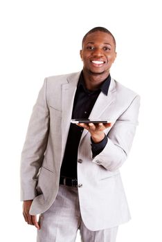 Handsome businessman working on tablet computer. Isolated on white.