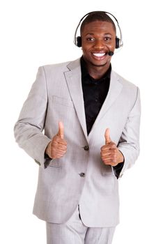 Charming customer service representative with headset on gesturing thumbs up.