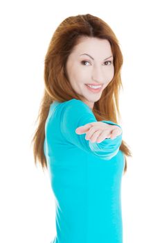 Happy , excited woman presenting copy space on her palm, isolated on white