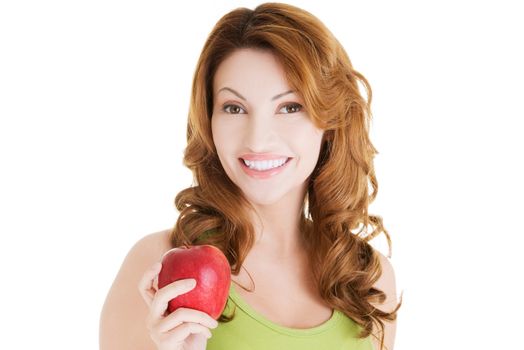Beautiful woman with red fresh apple.
