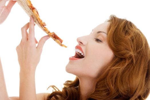 Happy woman eating pizza. Over white background.