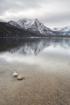 A calm winter day at Lake Staley showing the Sawtooth Range