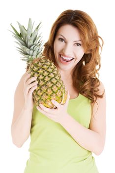 Happy woman with fresh pineapple fruit, isolated on white