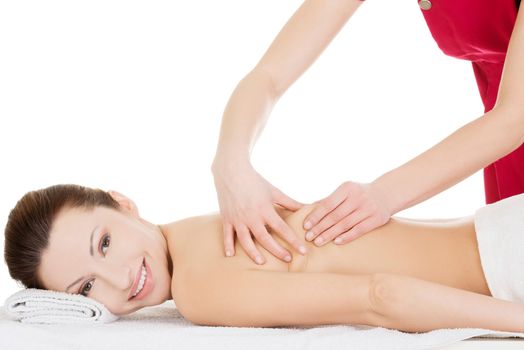 Preaty woman relaxing beeing massaged in spa saloon