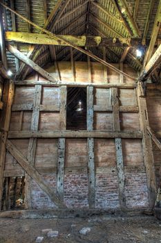 Large timber-framed and brick hay barn, Worcestershire, England.