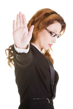 Serious business woman gesturing stop sign, isolated on white