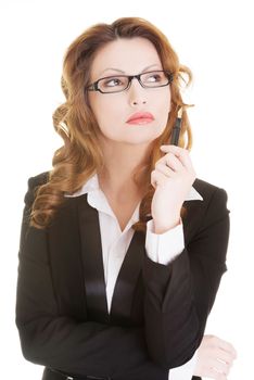 Thoughtful pretty businesswoman, against white background