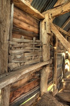Interior of timber-framed barn showing wattle infill detail, Worcestershire, England.