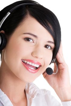 Beautiful young call-center assistant smiling , isolated