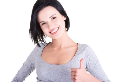 Beautiful young woman in casual clothes gesturing thumbs up.