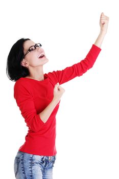 Excited happy young woman with fists up, isolated