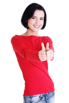 Beautiful young woman in casual clothes gesturing thumbs up.