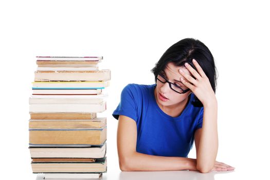 Sad female student with learning difficulties , isolated on white