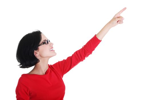 Happy , excited young woman pointing on copy space, isolated on white