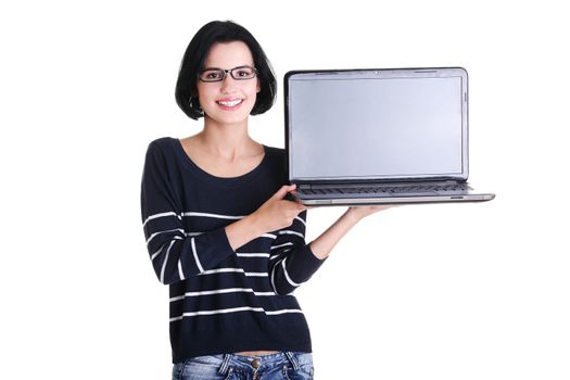 Portrait of young woman holding and showing screen of 17 inch laptop