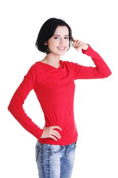 Young happy woman gesturing "call me" , isolated