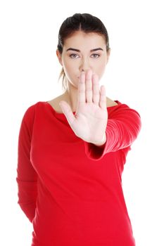 Hold on, Stop gesture showed by young woman hand
