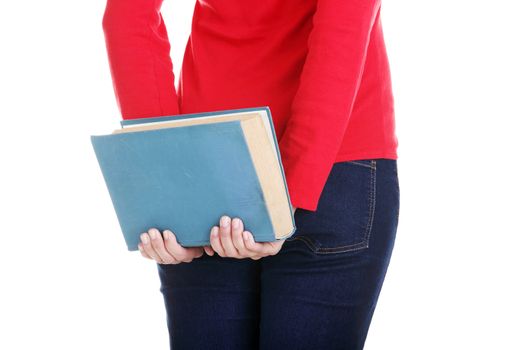 Back view of young student woman holding an old book. Isolated over white background.