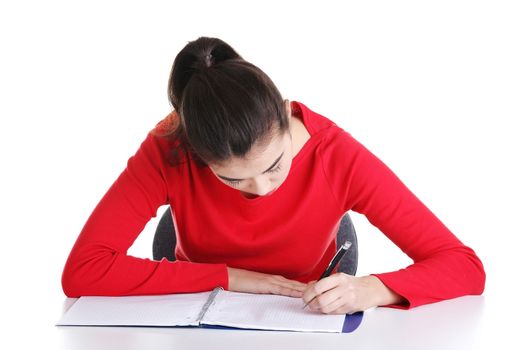 Adult student woman learnig at the desk, isolated on white background