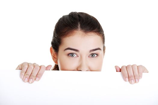 Portrait young happy woman with blank board , isolated on white