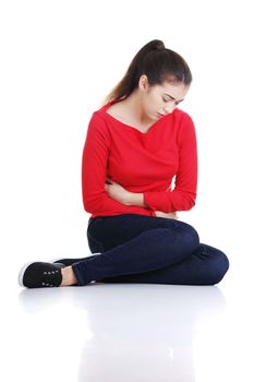 Young woman with stomach issues,isolated on white