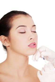 Cosmetic botox injection in the female face, lips zone