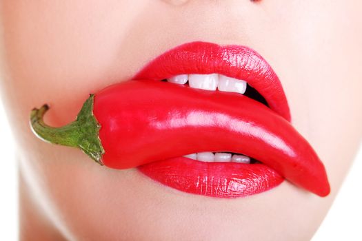 Beautiful woman with hot paprika, isolated on white