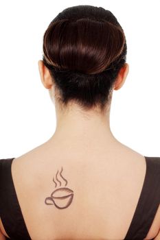 Elegant woman in dress with coffee symbol on her back.