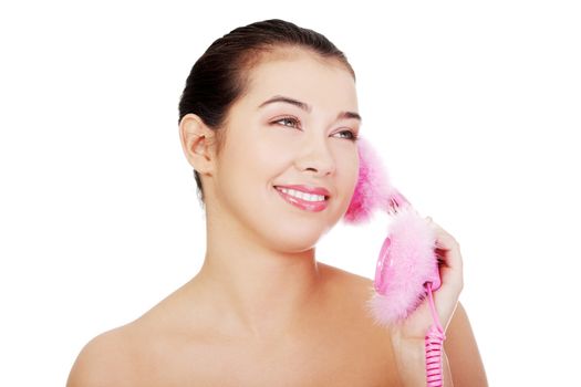 Happy woman on the phone, isolated on white