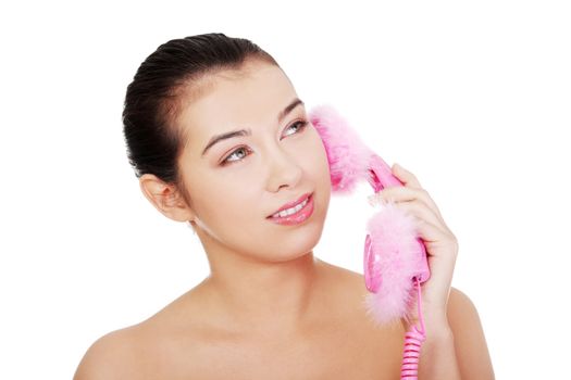 Happy woman on the phone, isolated on white