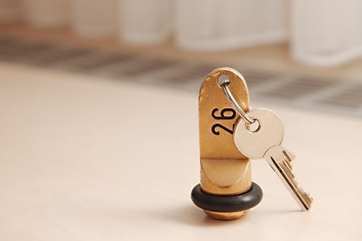 Hotel room key on a table