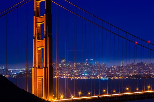 Golden Gate Bridge San Francisco sunset view through cables in California USA