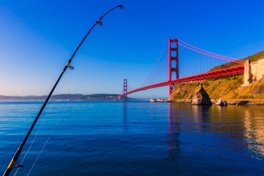 San Francisco Golden Gate Bridge with fishing rod California USA