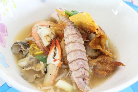 Closeup of Thai noodle soup with seafood