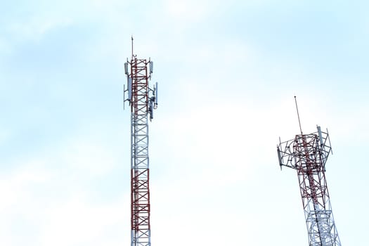 Communication tower against a blue sky