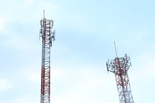 Communication tower against a blue sky