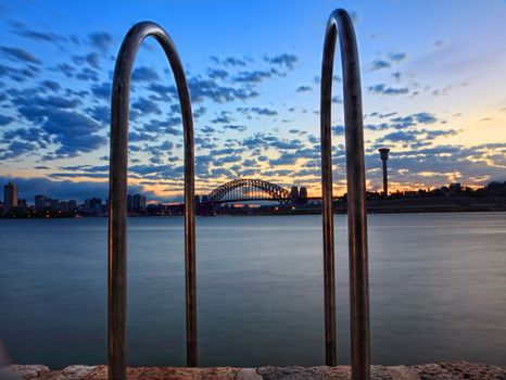 This is the view of Sydney from Balmain.  Taken just minutes before gale southerly winds rolled in completely changing this pretty scene to an overcast  hazy morning with choppy seas.  16 sec exposure.  