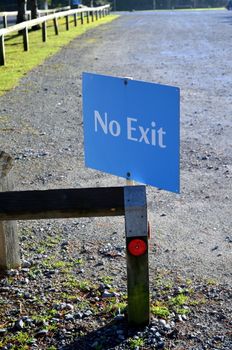 No exit sign at a vehicle parking site.