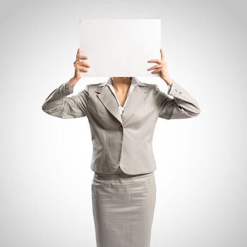 business woman holding a poster, place for text