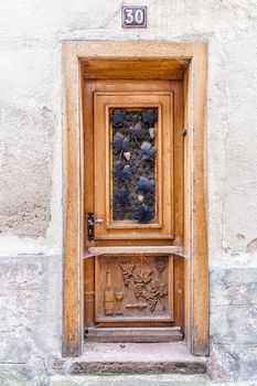 Antique Door with wine Ornament in Alsace