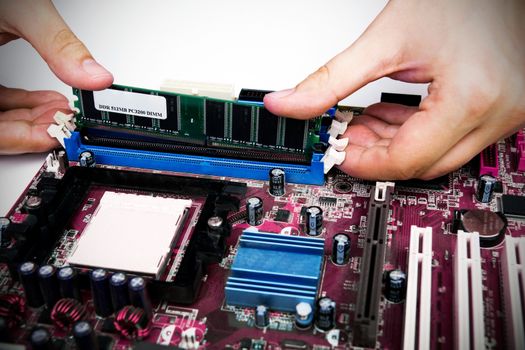 Man installing memory. PC motherboard RAM upgrade