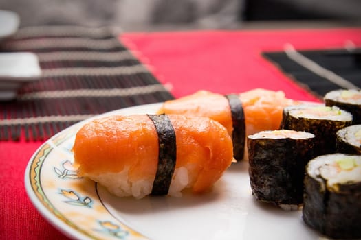 Closeup of salmon and rice. Sushi set macro composition
