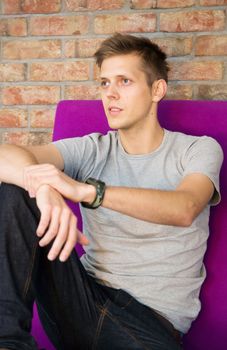 Man sitting in chair and relaxing