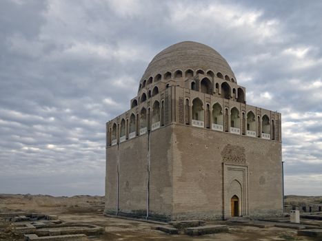 Twelfth-century mausoleum of Seljuk ruler Ahmad Sanjar (1118 - 57) at the center of the ruined ancient city of Sultan Kala, Merv Oasis of the Karakum Desert, UNESCO World Heritage site,  Turkmenistan